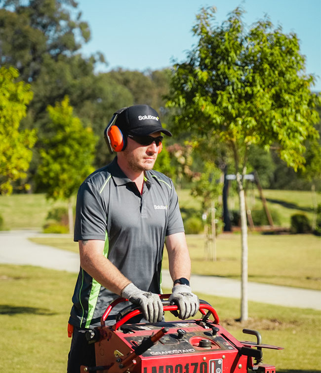 Landscape Maintenance - Team Member Mowing