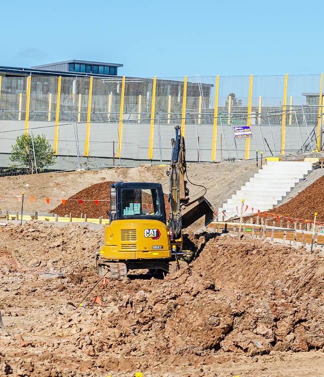 Excavator Working on Slope Civil