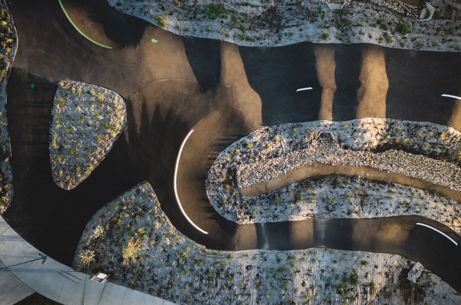 Top view of portion of the pump track featuring a loop turn point